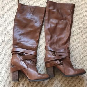 Gently used Nine West boots with ankle straps.